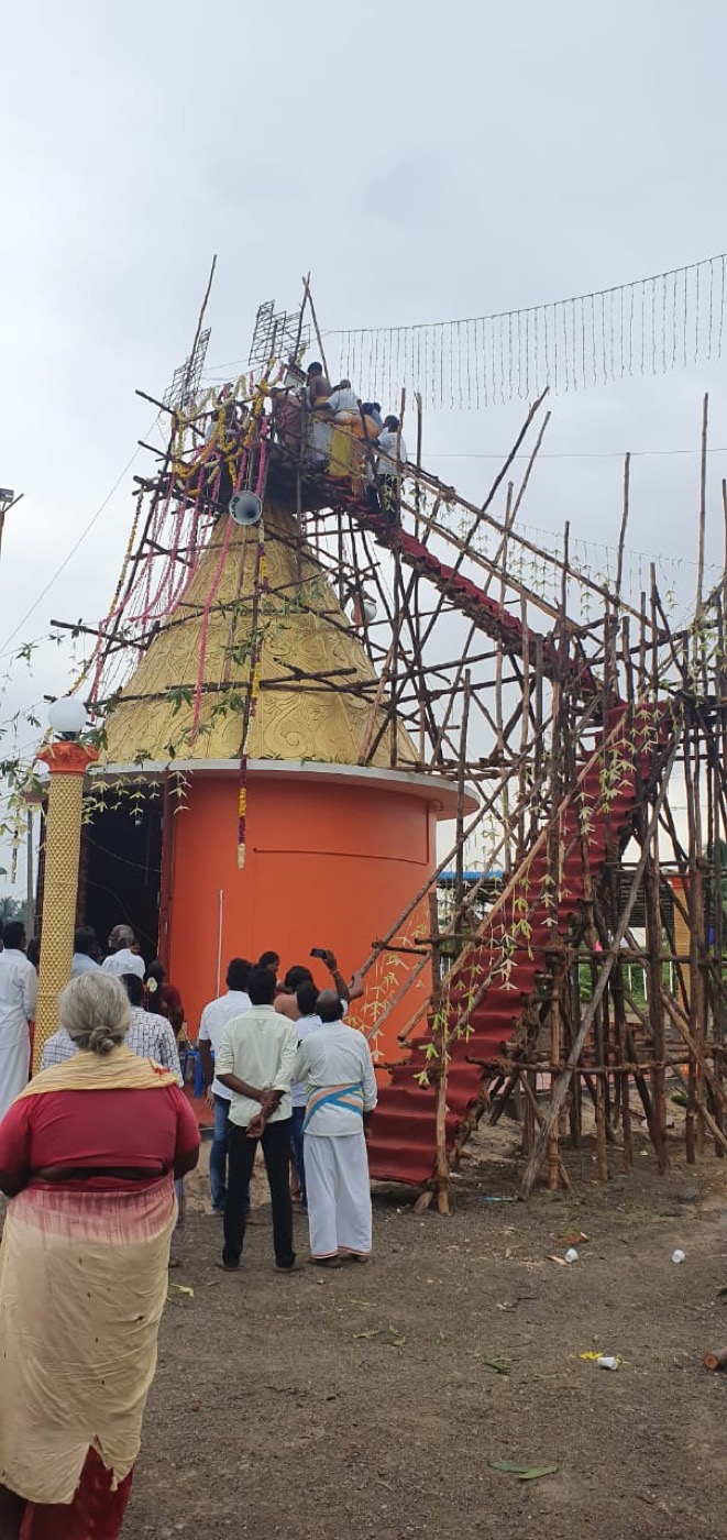Decorated stairway and scaffolding for Kumbabishekam